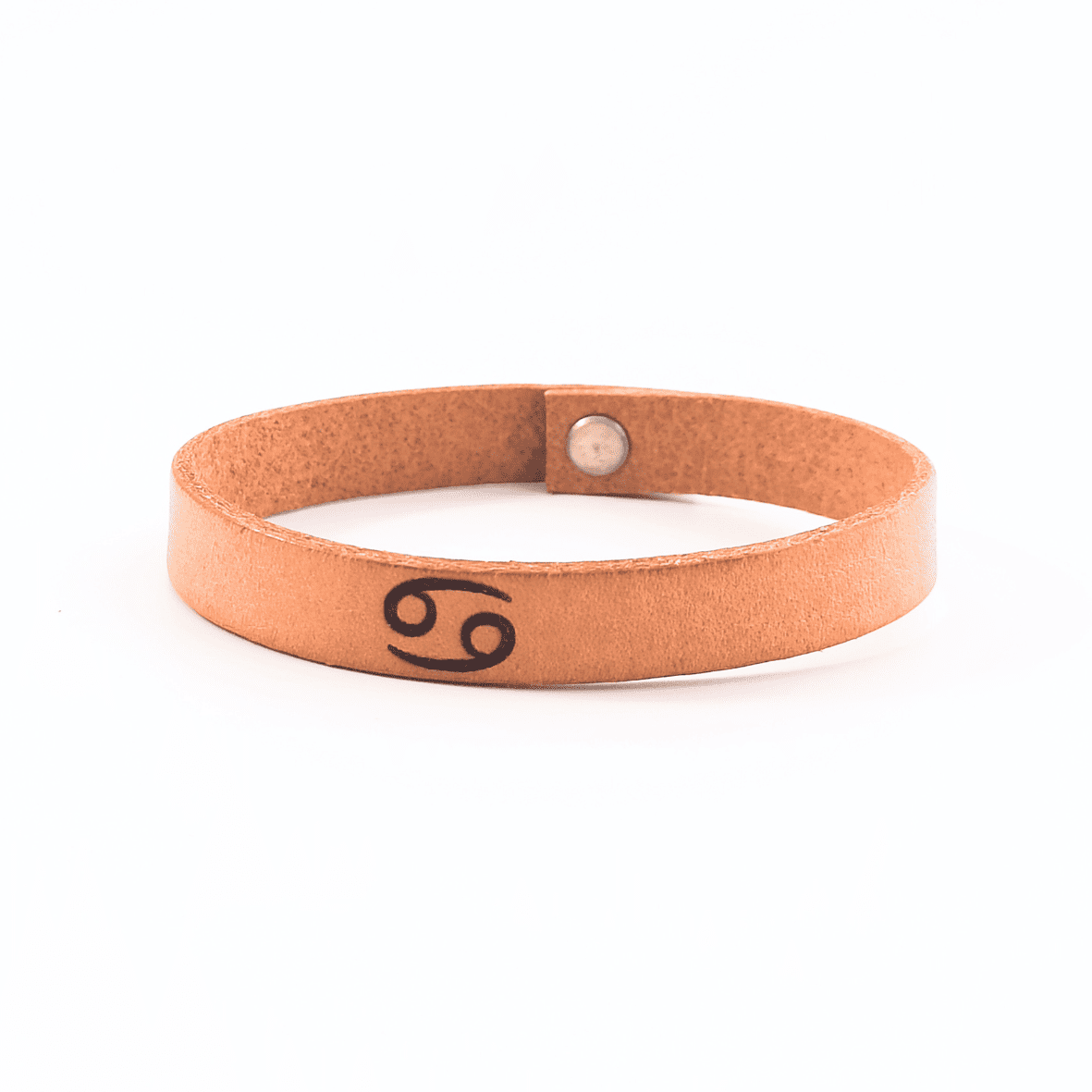 Brown leather bracelet with cancer´s  symbol engraved on it.