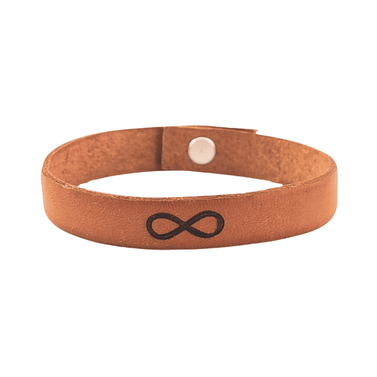 A brown leather bracelet with an infinity symbol engraved on it.