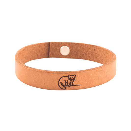 A brown leather bracelet with a  red panda engraved on it.